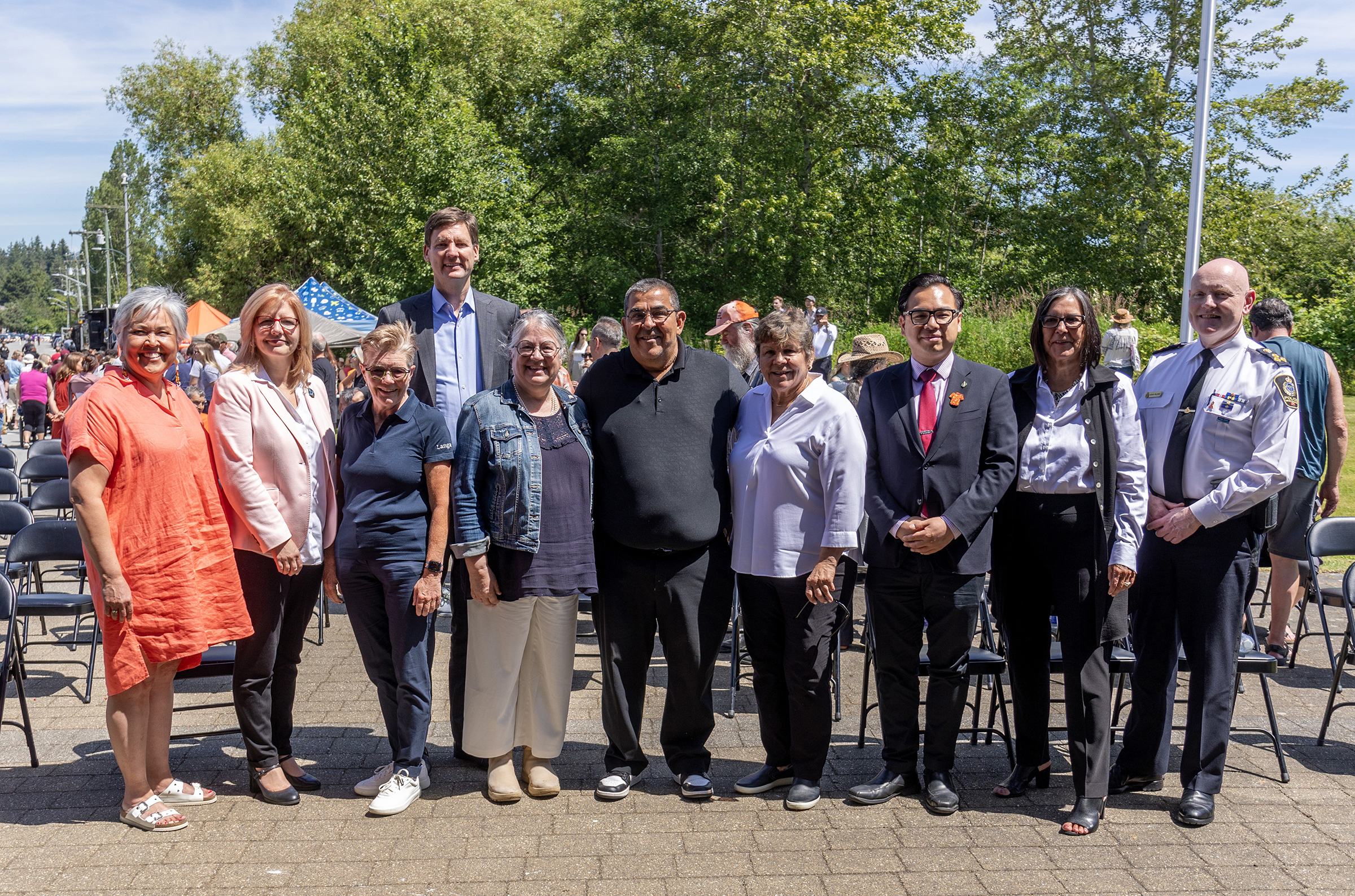 From left: Rosalind Campbell, Tamara Vrooman, Dr. Paula Burns, Premier David Eby, Minister Diane Lebouthillier, Chief Wayne Sparrow, Gail Sparrow, MP Wilson Miao, Wendy Grant-John, and Adam Palmer.