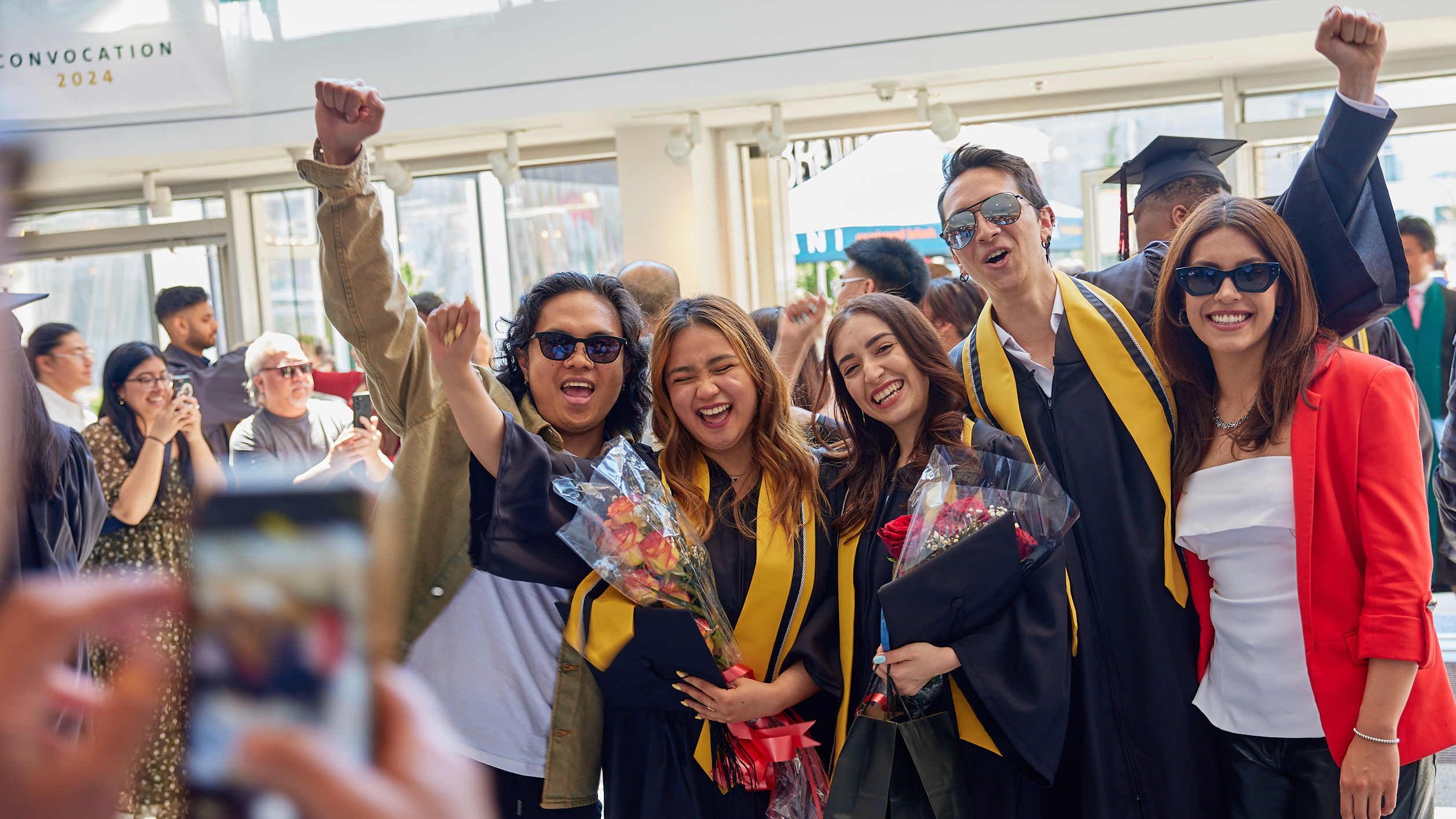 Langara students celebrating at convocation
