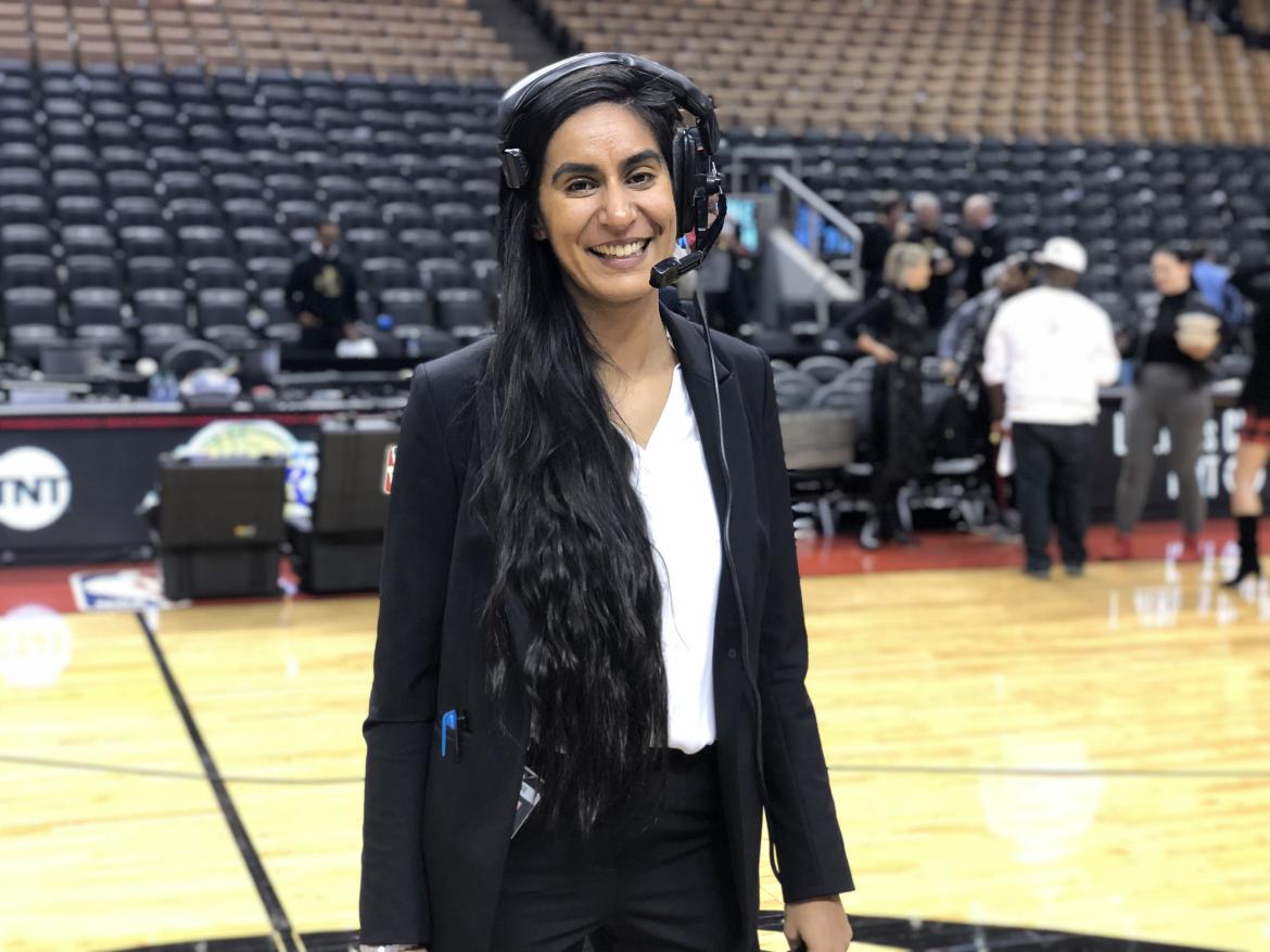 Kavita Dhillon on the Golden State Warriors court in her role as Executive Producer, Game Experience.