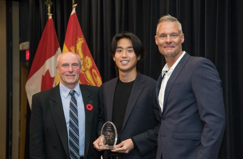 Takeru Kaku accepting the Canadian Collegiate Athletics Association (CCAA) Player of the Year award.