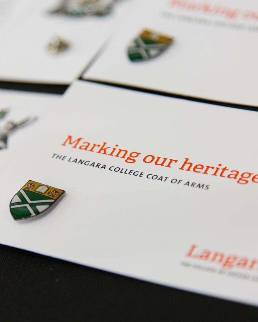 Pins featuring the Langara Coat of Arms