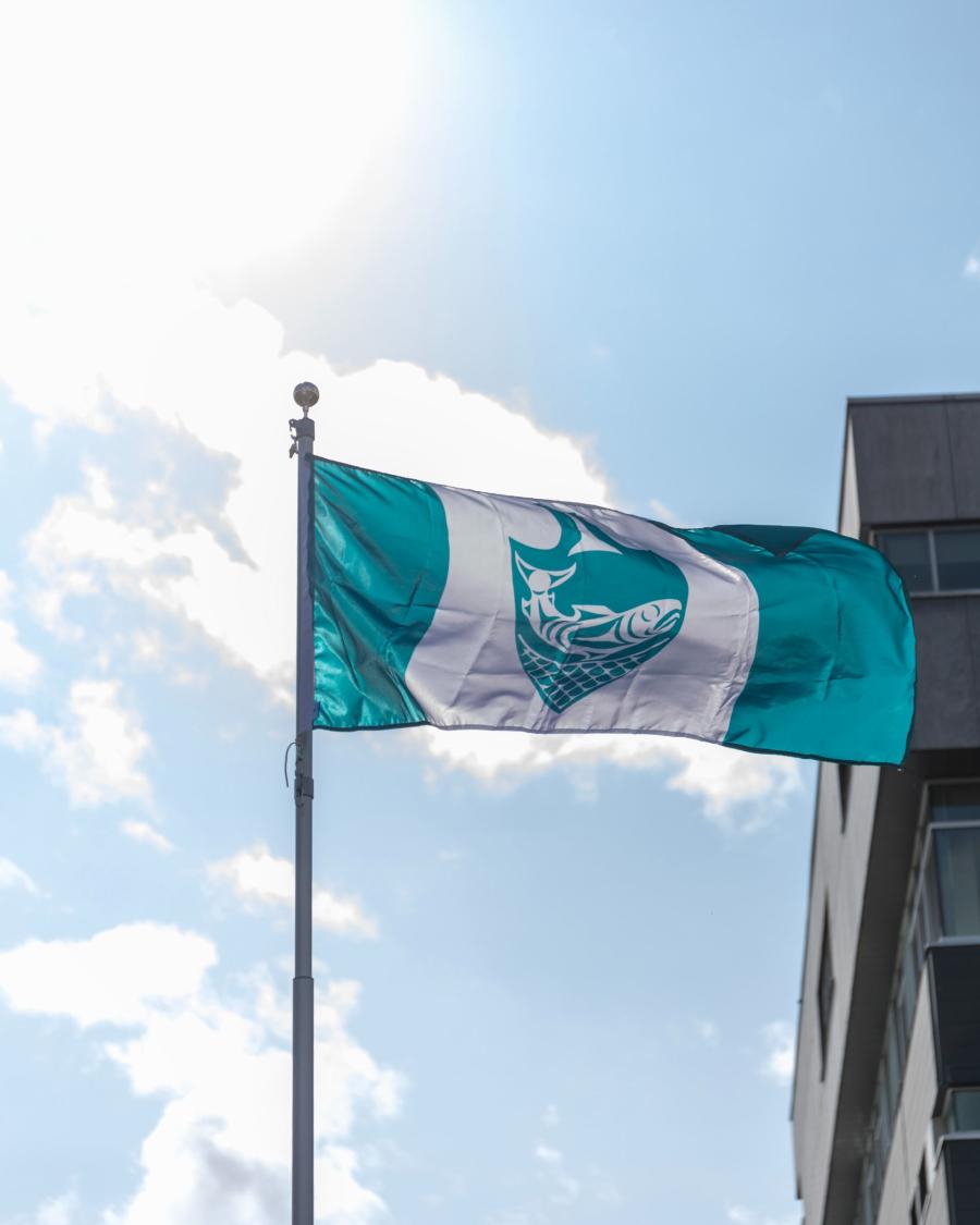 The Musqueam flag flying at Langara's main campus