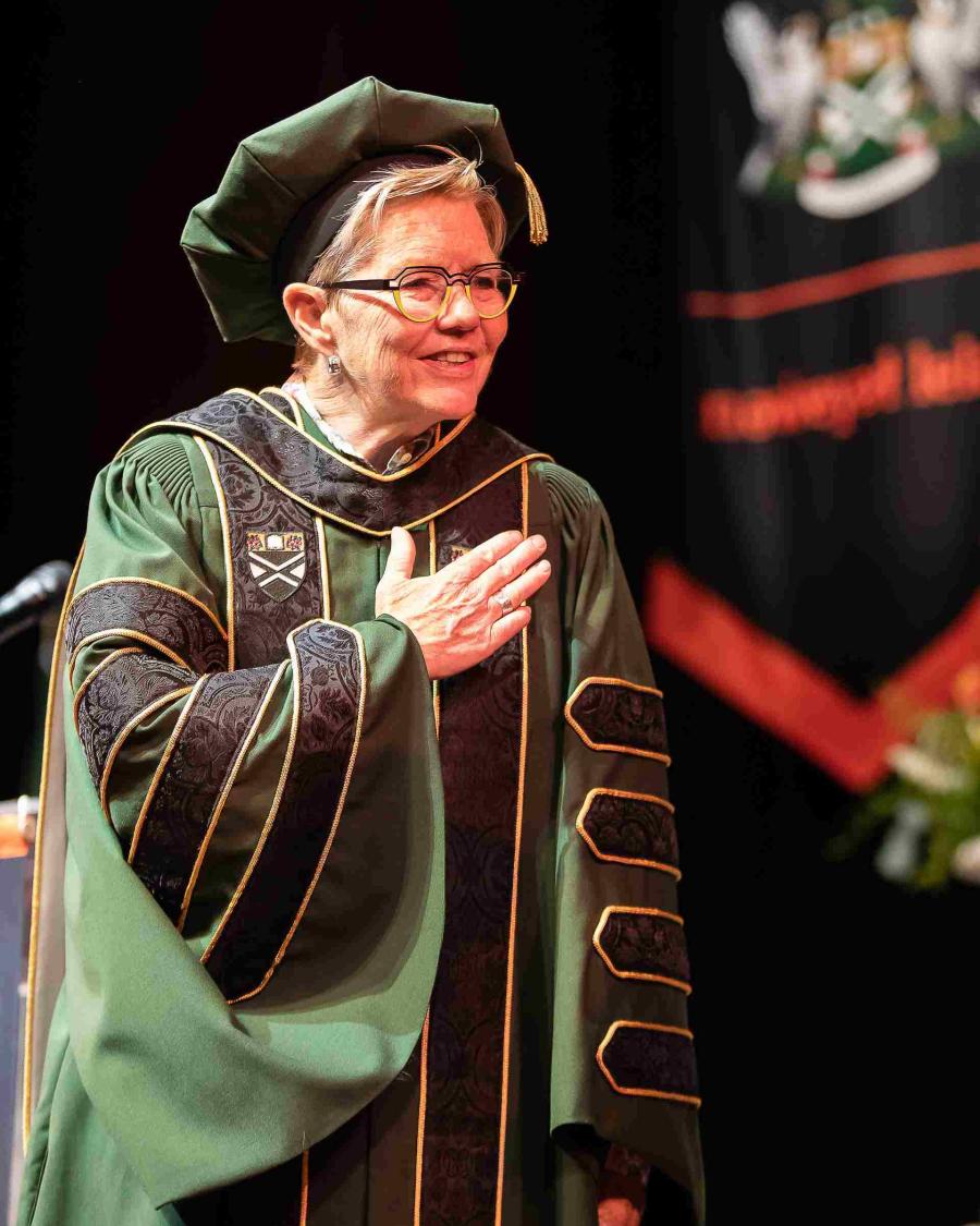 Dr. Paula Burns wears the president's regalia during convocation ceremonies